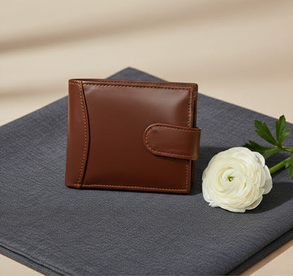 Ultra slim brown 100% genuine leather men's wallet laid out on a clean surface showing neat edge stitching and leather-lined card slots.