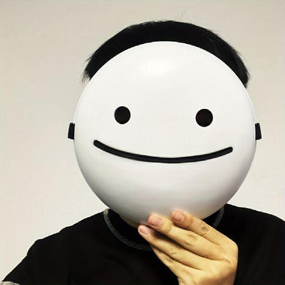 Front view of a white PVC smiling Halloween mask featuring a bold black grin displayed against a clean background.