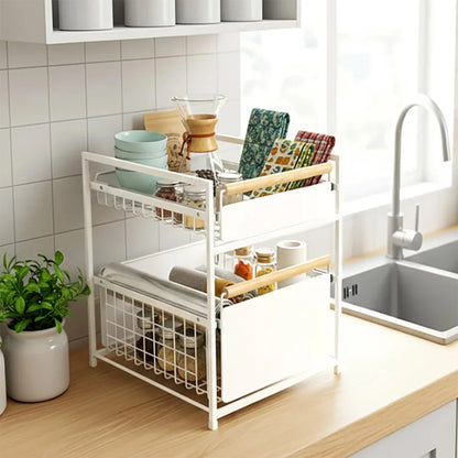 The Mesa 2-Tier Organiser with Drawers displayed on a countertop, showcasing its stacked metal wire drawers, robust frame, and wooden accent handles.