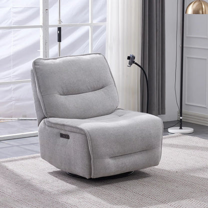 Front three-quarter angle of the Meteor grey fabric power reclining swivel chair, highlighting its plush textured weave, modern armrests, adjustable wireless charging phone cradle, and metallic swivel base.