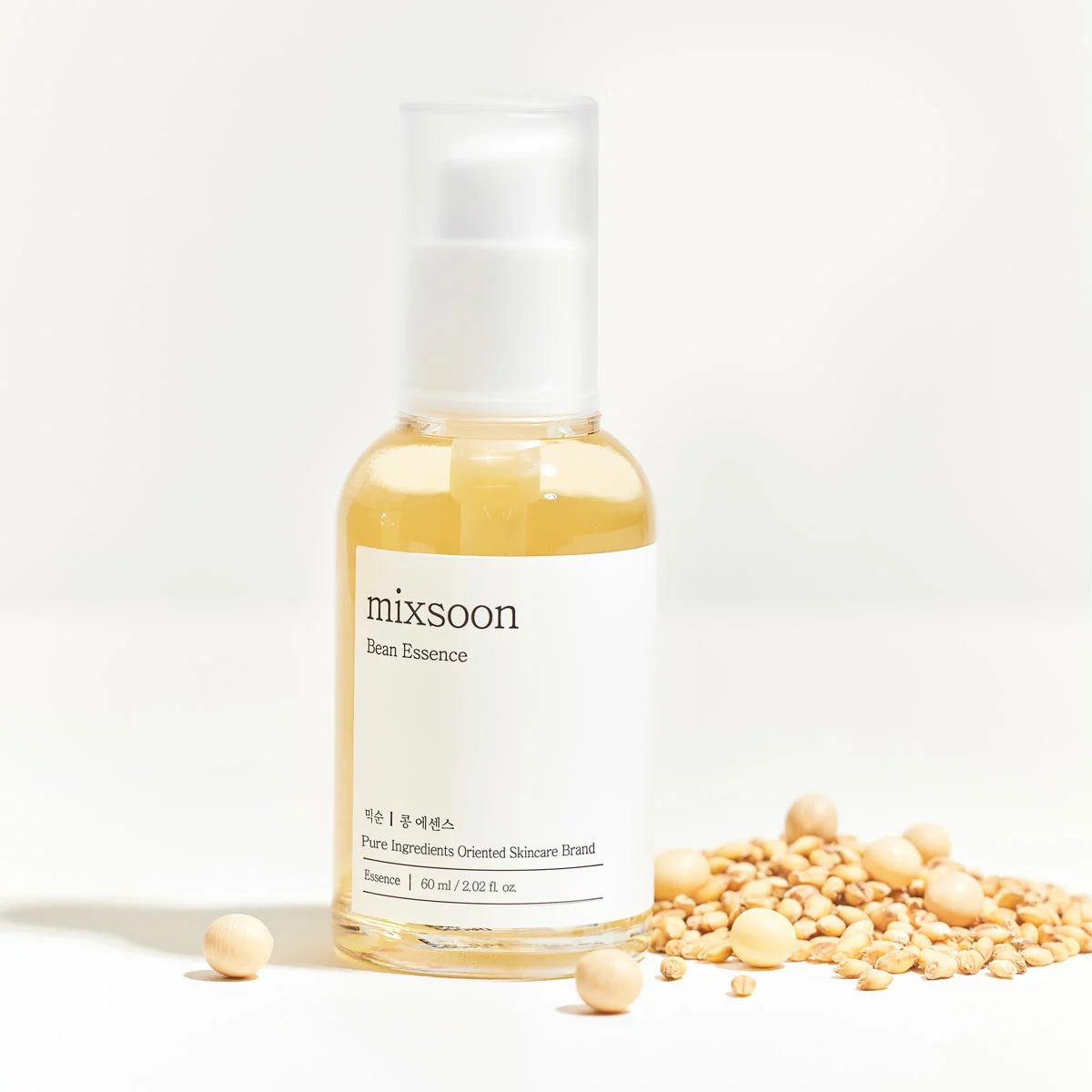 Two 60ml bottles of Mixsoon Bean Essence presented in their signature minimalist packaging.