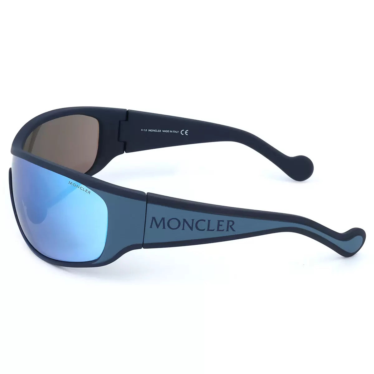 Profile view of the Moncler ML0129 92X sunglasses featuring metallic detailing, resting on a textured granite surface in bright natural light.