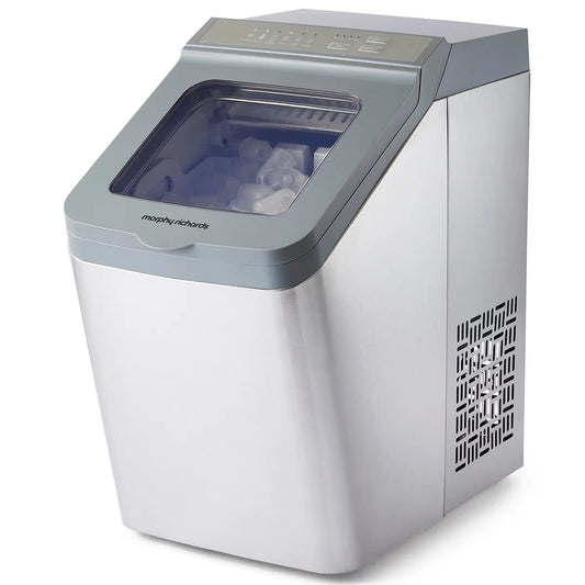 Morphy Richards FrostPro silver bullet ice maker machine on a clean kitchen countertop with clear viewing window showing bullet ice cubes and included scoop.