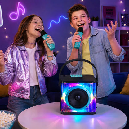 Front view of the vibrant Music Creator Pulse Karaoke Station speaker with pulsing colorful LED lights and two sleek wireless microphones standing alongside.