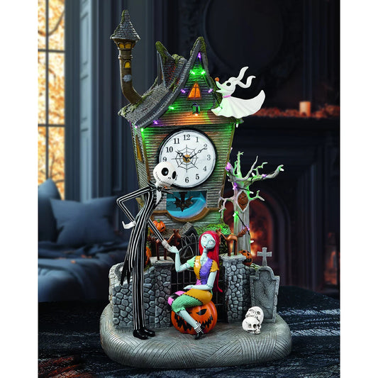 Front view of the 55cm hand-painted NBC animated clock tower featuring Jack Skellington and Sally illuminated by built-in LED lights on a tabletop setting.