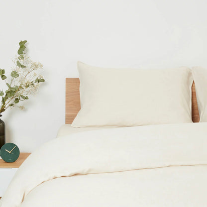 Panda Natural Bamboo and French Linen Duvet Cover Set on a bed showing crisp matte texture, Oxford pillowcase edges, and raw bamboo buttons.