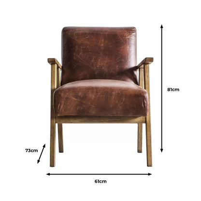 A side angle view of the Gallery Neyland brown leather armchair highlighting its rich top grain upholstery and smooth solid wood frame in a bright room.
