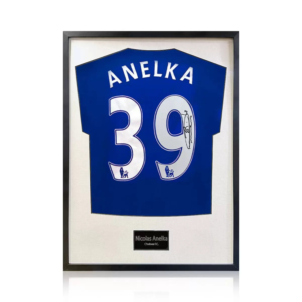 A professionally framed official Chelsea football shirt signed by Nicolas Anelka, displayed with a crisp white mount inside a sleek, high-quality wooden frame.