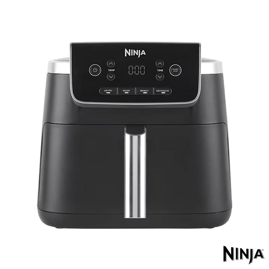 Front angle view of the black Ninja AF140UK 4.7L Air Fryer Pro sitting on a modern kitchen countertop with its digital display lit up.