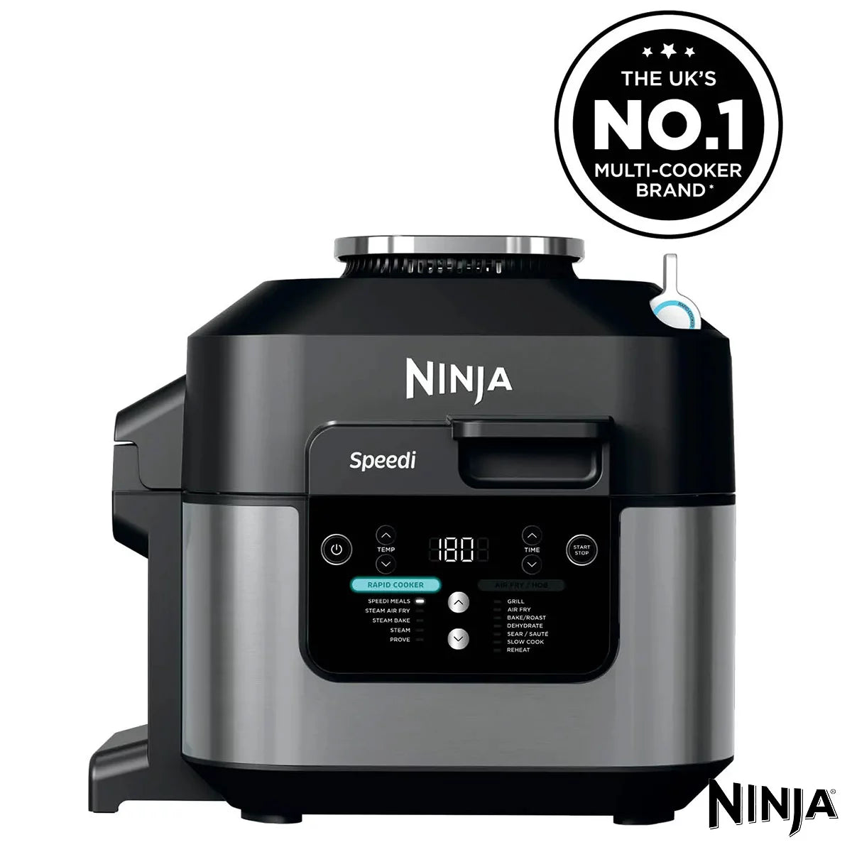 Front view of the black steel Ninja Speedi ON500UK multi cooker sitting on a dark kitchen countertop with its lid open, displaying cooked chicken breasts and steamed vegetables inside the inner pot.