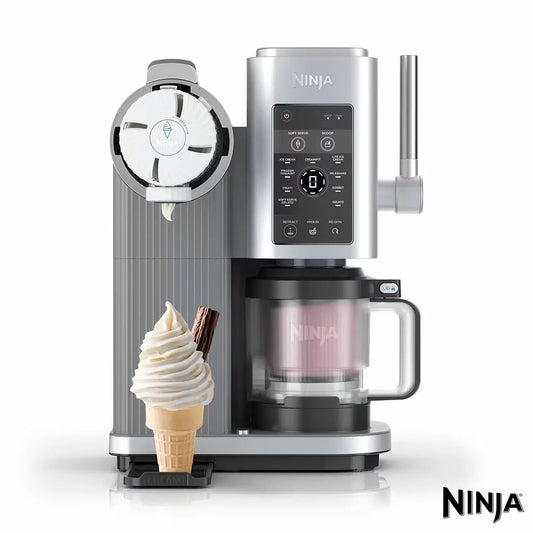 Front angle shot of the grey Ninja Swirl NC701UK soft serve maker dispensing a smooth vanilla ice cream swirl directly into a waffle cone.