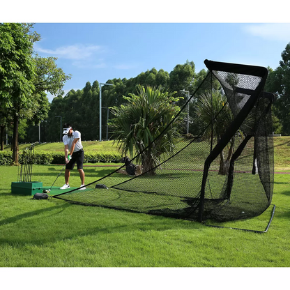 Front three-quarter view of the large black On Par Deluxe Home Golf Driving Net set up on a green garden lawn with its wide side protection wings fully extended.