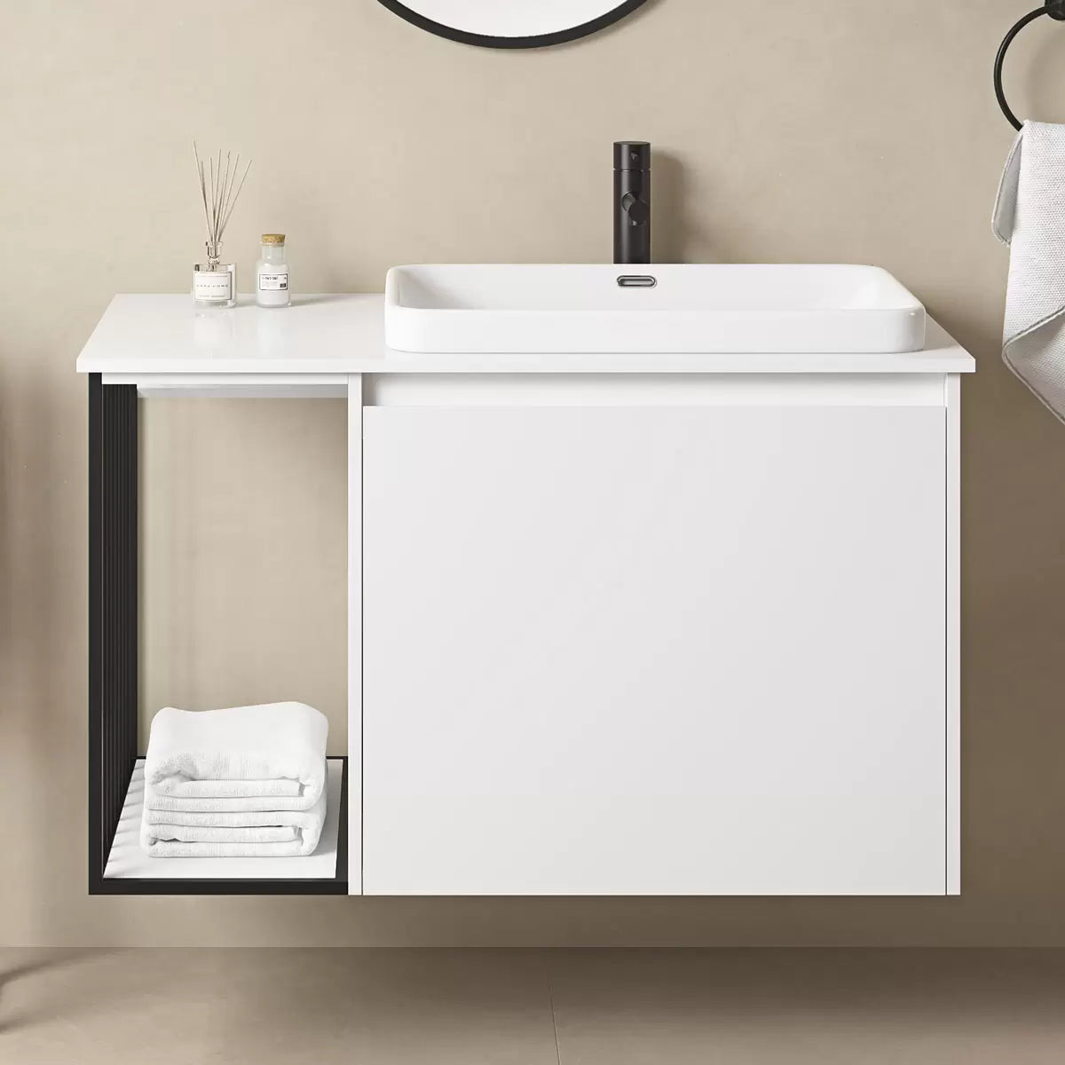 Front angle view of the Ove Judy 1000mm wide matte white wall-mounted vanity featuring a right-offset white quartz countertop sink and a modern handle-free drawer in a bright, modern bathroom setting.