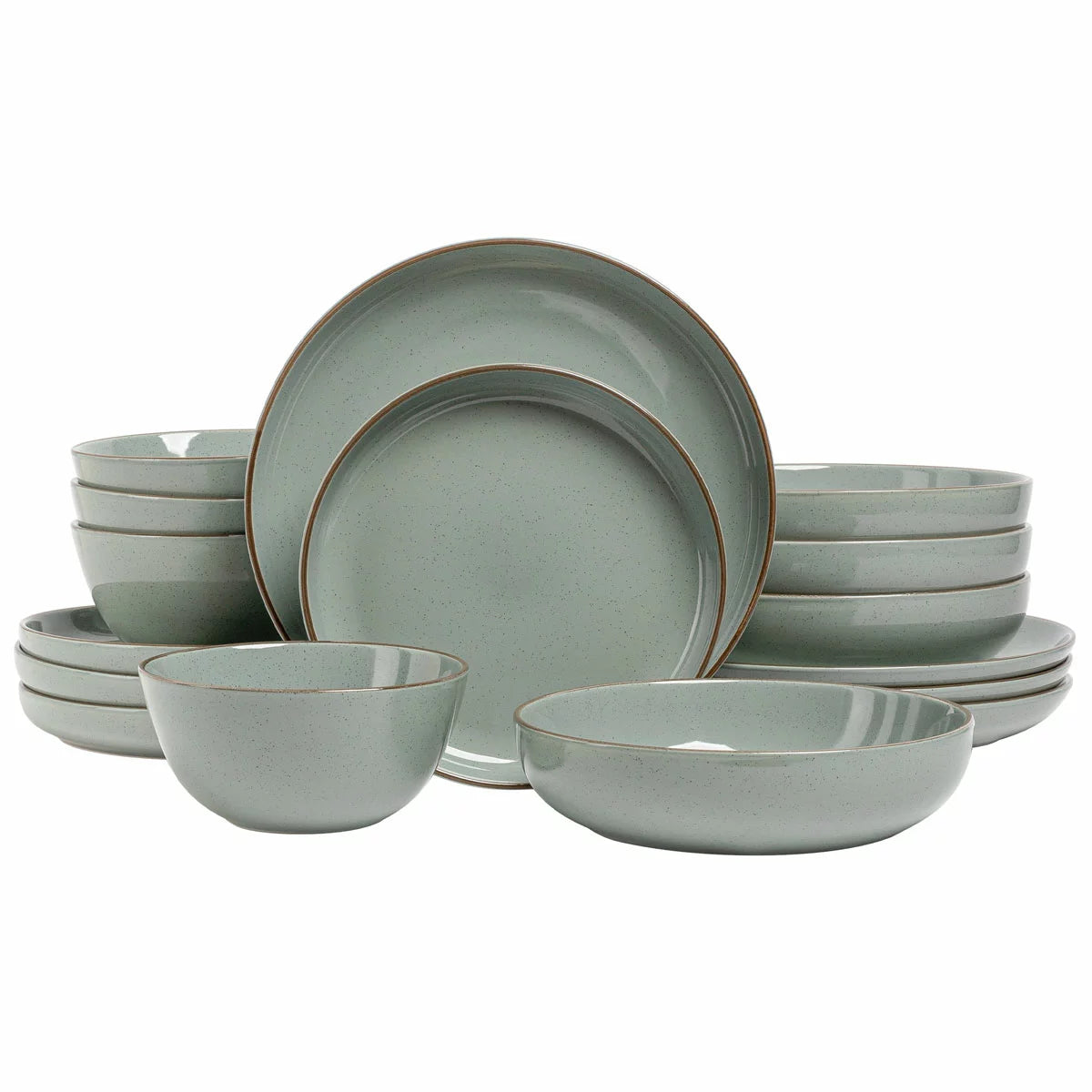 Over & Back 16 piece stoneware dinnerware set in light grey stacked neatly on a rustic wooden dining table
