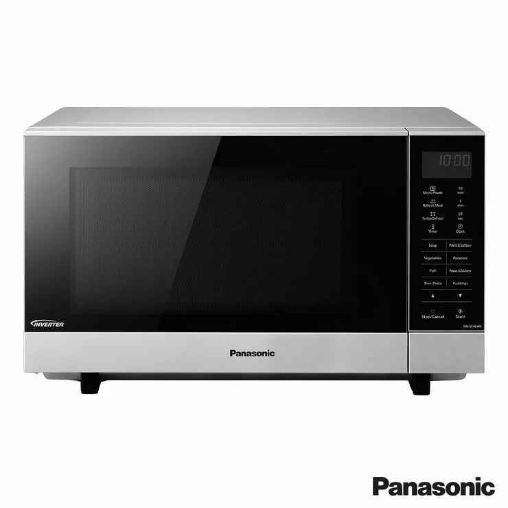 Panasonic NN-SF464MBPQ 27L flatbed microwave in silver, showing the mirror-effect door and spacious interior cavity, set on a modern white kitchen countertop.
