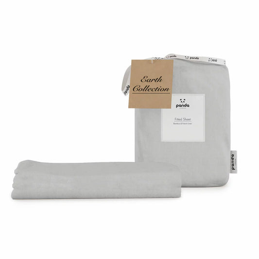 Neutral grey Panda bamboo and French linen fitted sheet pulled taut over the corner of a deep mattress showcasing its textured matte finish.