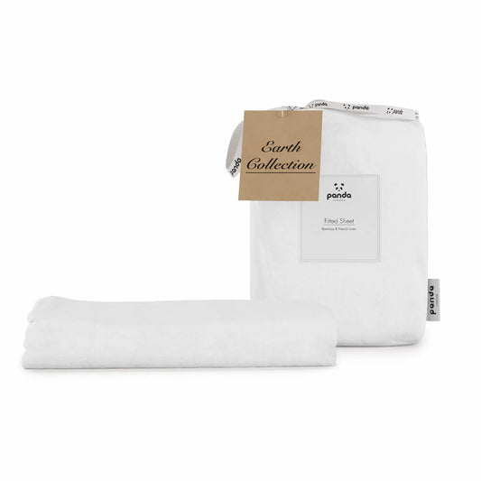 Crisp white Panda bamboo and French linen fitted sheet pulled taut over the corner of a deep mattress showcasing its textured matte finish.