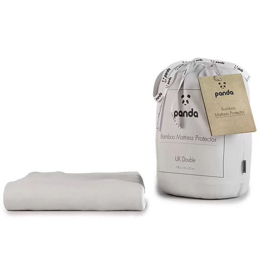 Soft white Panda Bamboo Mattress Protector showing its textured bamboo surface and deep fitted skirt fitted on a modern mattress.
