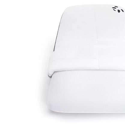 Panda Hybrid Memory Foam Pillow showcasing its white bamboo cover and distinct grey 3D mesh border on a modern bed