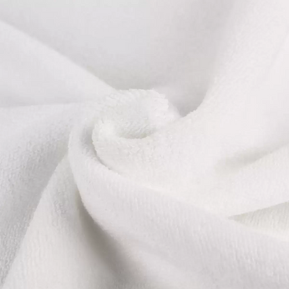 Close-up texture shot of the open-loop, zero-twist fabric on the Panda towel showing its plush thickness and weave quality.