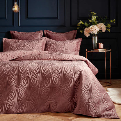Soft blush pink Paoletti velvet duvet cover featuring intricate palm embroidery with matching Oxford pillowcases on a modern bed setup.