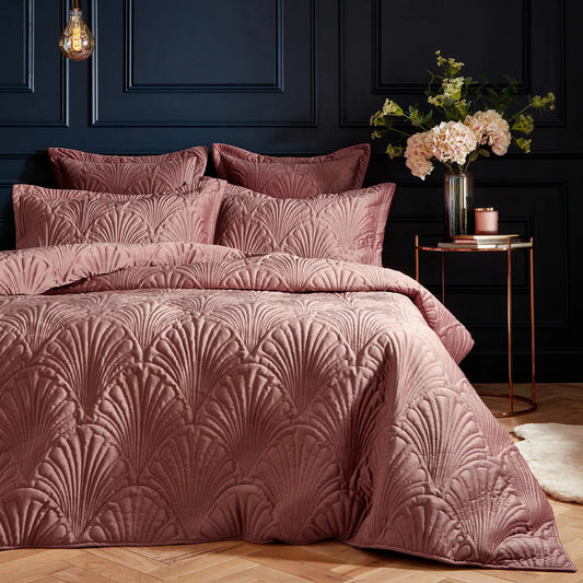 Soft blush pink Paoletti velvet duvet cover featuring intricate palm embroidery with matching Oxford pillowcases on a modern bed setup.