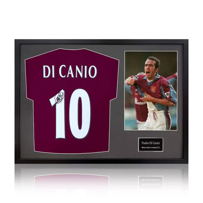 A professionally framed West Ham United jersey autographed by Paolo Di Canio, presented alongside an action photograph in a high-clarity display case.