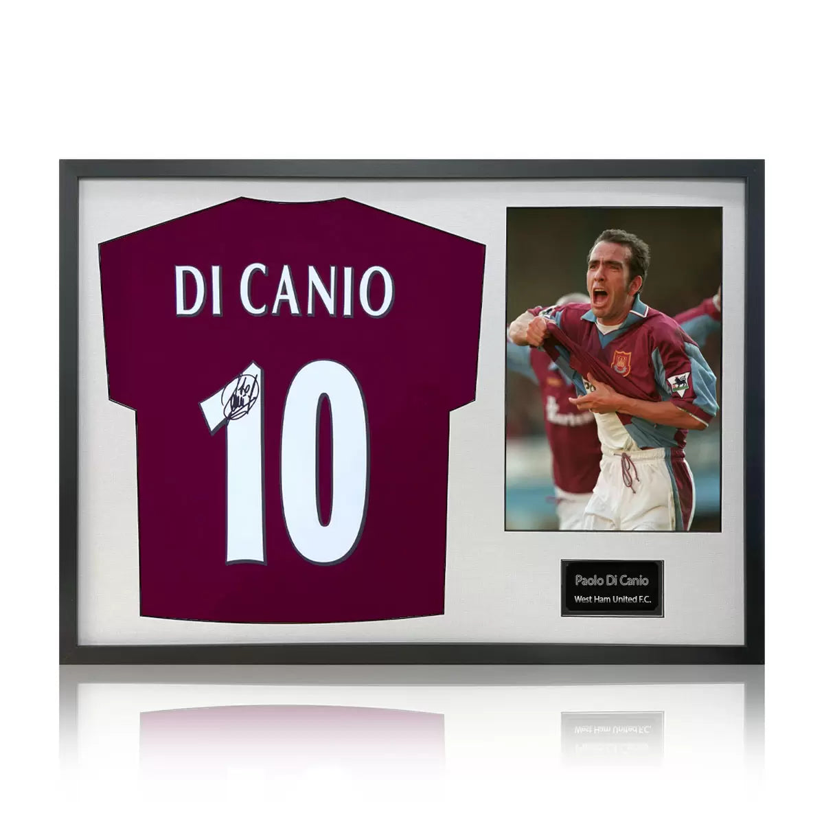 A professionally framed West Ham United jersey autographed by Paolo Di Canio, presented alongside an action photograph in a high-clarity display case.