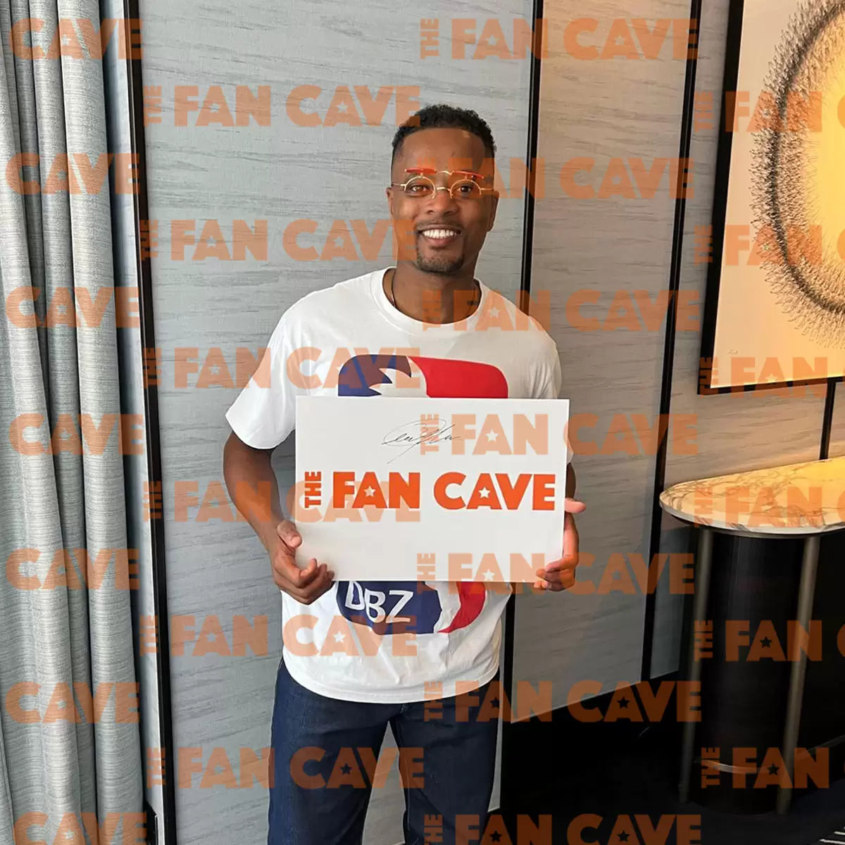 Patrice Evra hand-signed Manchester United action photograph displayed in a premium wooden frame with an etched metal nameplate.