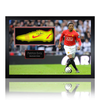 A single Manchester United football boot autographed by Patrice Evra, securely mounted in a professional wooden frame with an etched identification plaque.