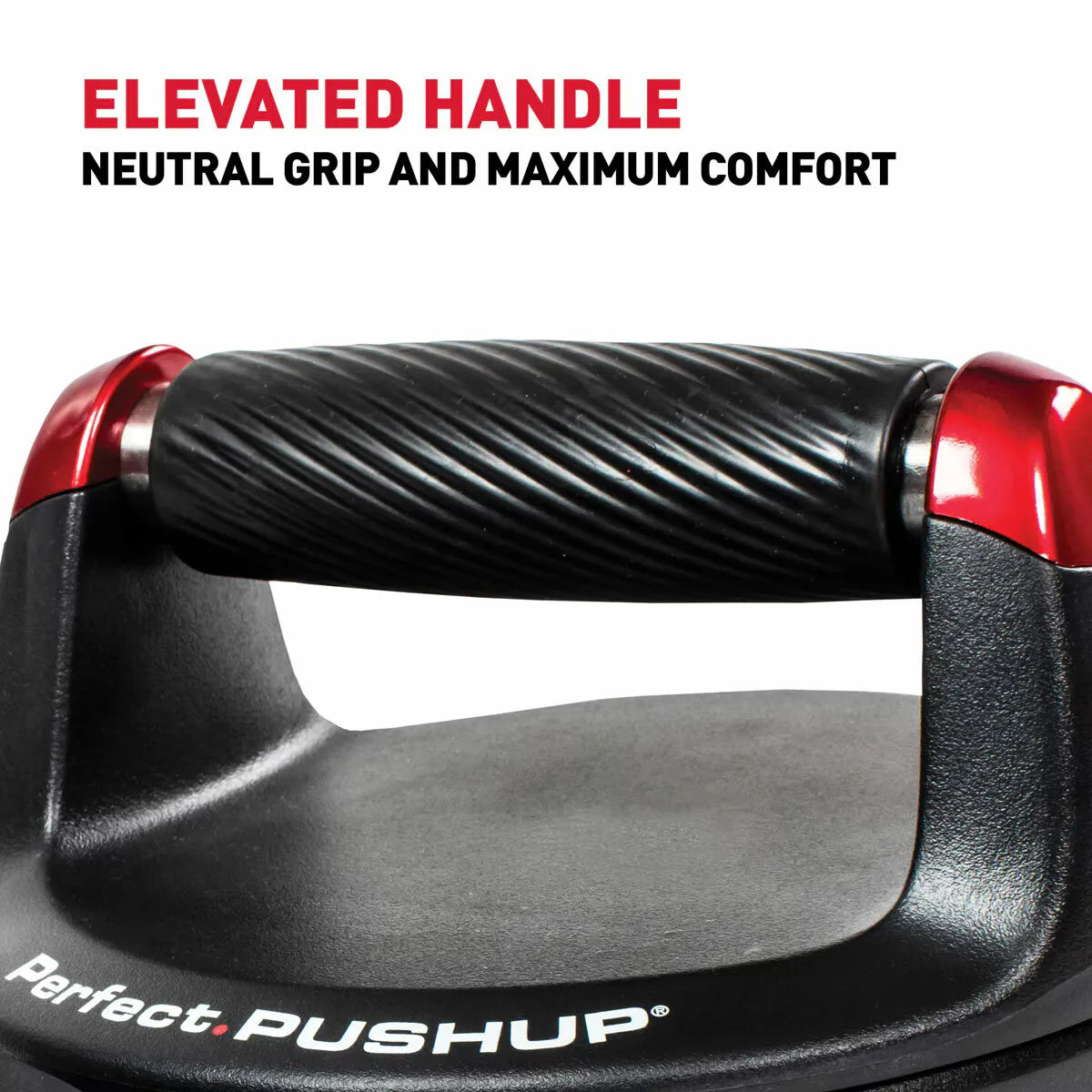 A pair of black Perfect Push Up Pro round training discs featuring ergonomic curved handles and high-grip rubberized treads, positioned on a dark home gym flooring mat.