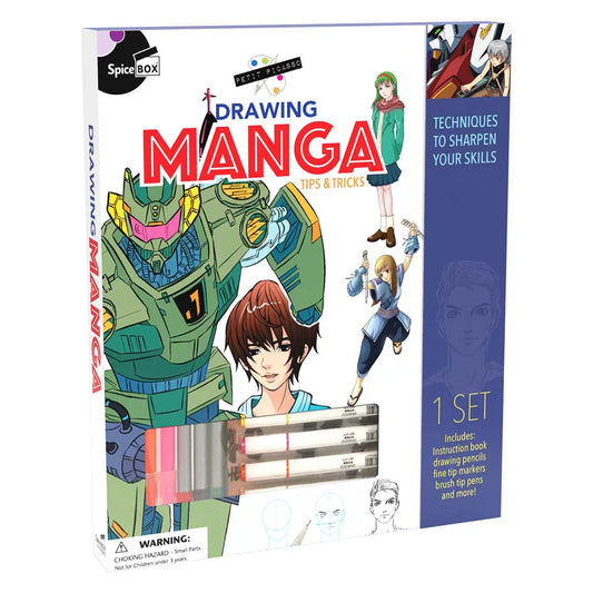 Open Petit Picasso Manga hardcover box set displaying the instruction book, guided sketchpad, dual-tip markers, mechanical pencil, and waterproof pen arranged inside its internal tray.