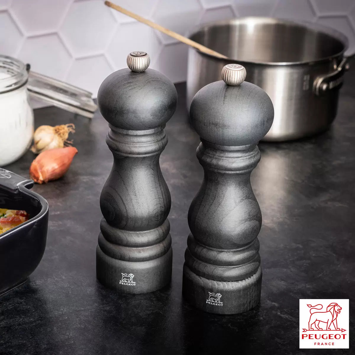 Iconic Peugeot Paris salt and pepper mill set in classic beechwood finish.