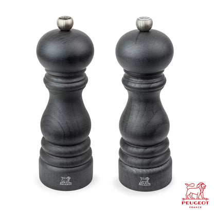 Iconic Peugeot Paris salt and pepper mill set in classic beechwood finish.