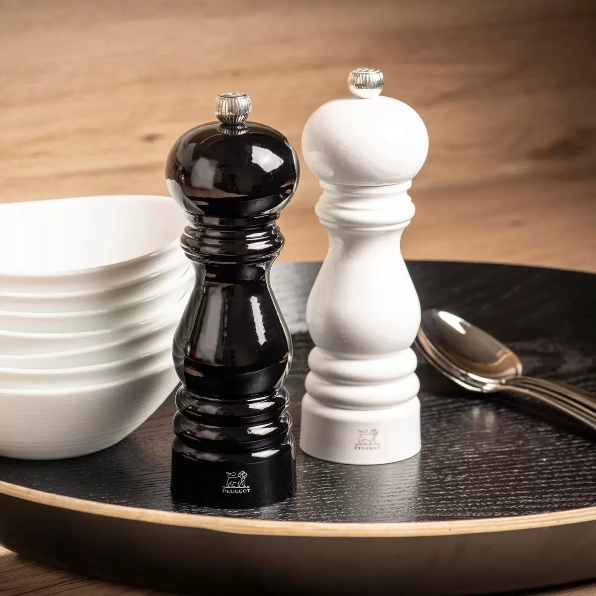 Iconic Peugeot Paris salt and pepper mill set in classic beechwood finish.
