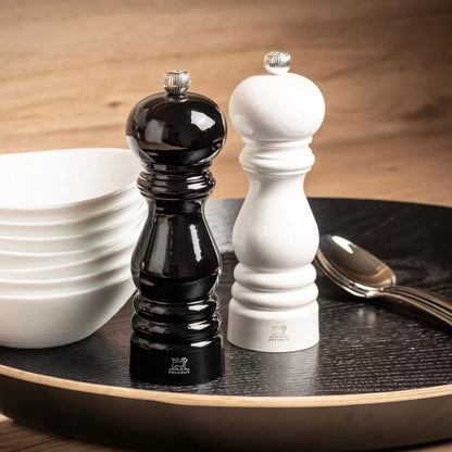 Iconic Peugeot Paris salt and pepper mill set in classic beechwood finish.