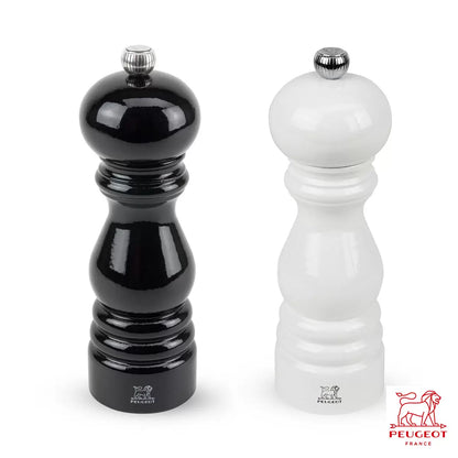 Iconic Peugeot Paris salt and pepper mill set in classic beechwood finish.