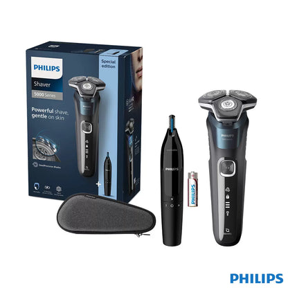 Philips Series 5000 electric shaver in a metallic finish, displayed with its nose trimmer accessory and travel case on a clean bathroom shelf.