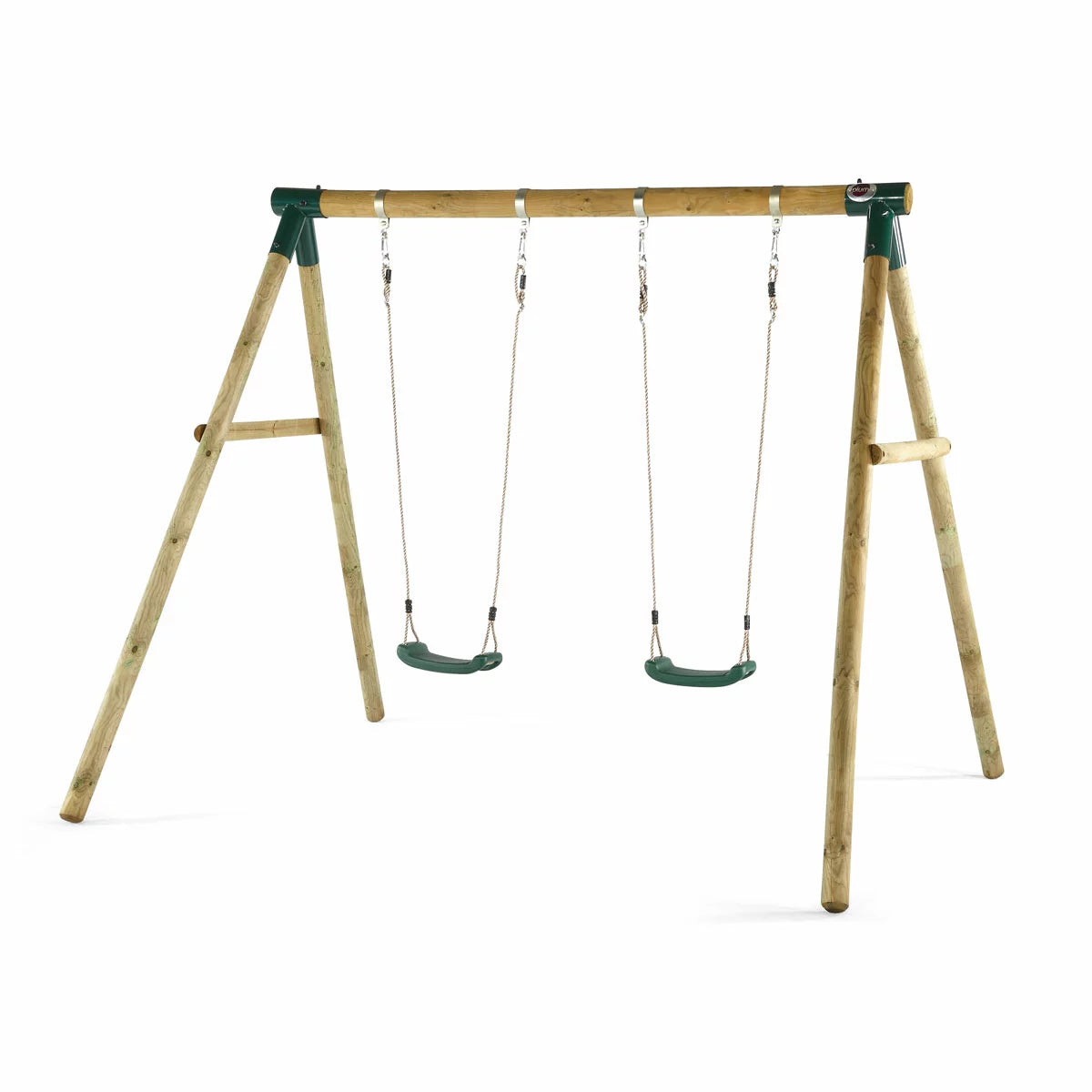 A Plum Ultimate premium wooden swing set standing in a lush green garden, featuring an assembled frame with a baby seat and trapeze attached, plus safety mats underneath.