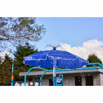 Plum Water Park Blaster Course blue outdoor play centre with climbing frame, water slide, sprinklers, monkey bars, and splash features installed in a garden for children's summer water fun-4