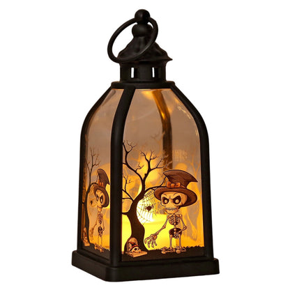 A portable black plastic Halloween handheld lantern glowing warmly with spooky pumpkin and skull pattern designs on a festive party table.