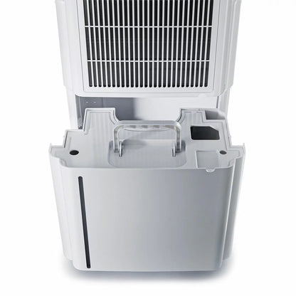 White rectangular Pro Breeze 20L premium dehumidifier standing upright on a modern hardwood floor next to an indoor clothes drying rack.