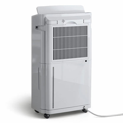 White rectangular Pro Breeze 20L premium dehumidifier standing upright on a modern hardwood floor next to an indoor clothes drying rack.