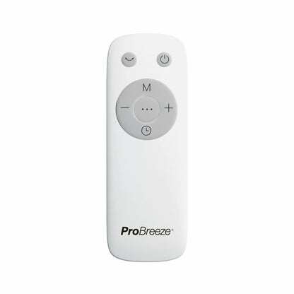 Front view of the white Pro Breeze OmniAir 41 inch premium bladeless tower fan and air purifier standing upright on a modern hardwood floor next to a living room sofa.