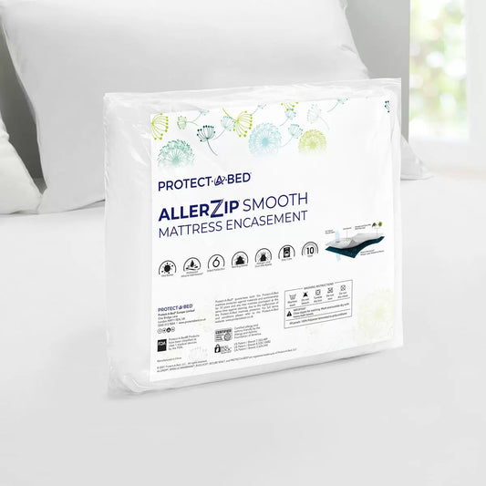 White Protect-A-Bed AllerZip Smooth Mattress Encasement fully zipped around a mattress showing the BugLock zipper seal detail.