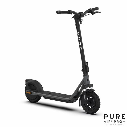 Side profile of the matte black Pure Air6 Pro folding electric scooter with 10 inch tubeless tyres and handlebar turn signals displayed on an urban pavement.