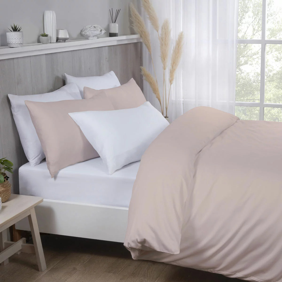Pink Purity Home 400 thread count cotton sateen king duvet cover set with matching pillowcases neatly arranged on a bed.