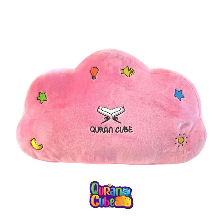 Soft yellow plush Quran Cube Dua Pillow showing stitched colorful button icons for Surahs and duas resting on a white bed sheet.