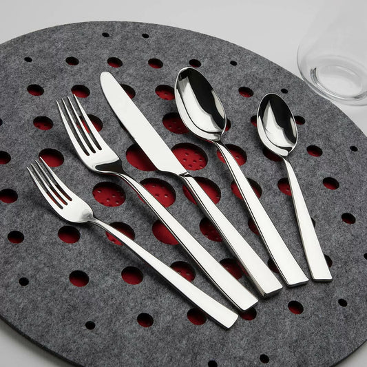Resto 60-piece stainless steel cutlery set with mirror-polished finish displayed for modern dining table use