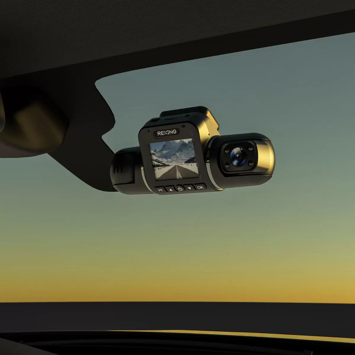 Matte black Rexing V2 Pro AI 3-channel dash cam unit mounted on a car windshield showing its swivel lens mechanism and rear camera extension wiring cables.